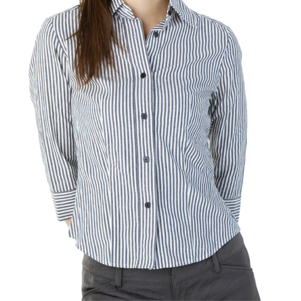 a woman wearing grey and white striped shirt